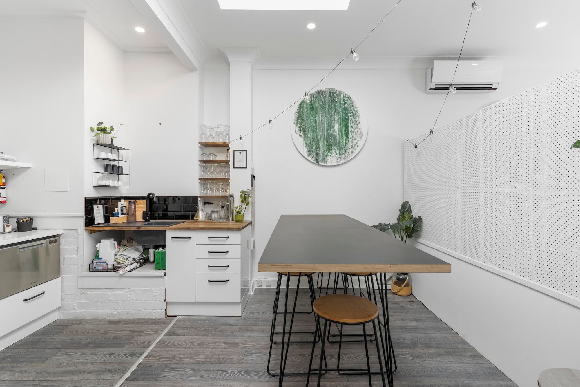 Bright and spacious coworking area with comfortable seating and work stations