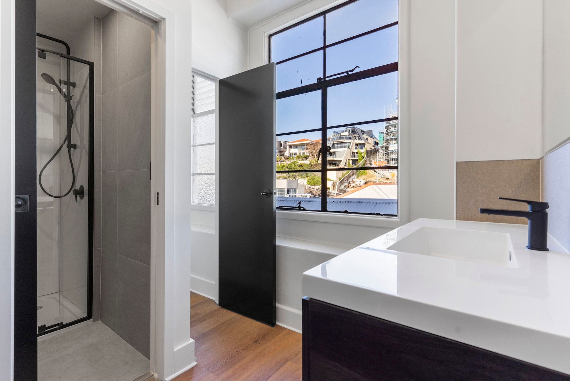 Open plan hot desk area with flexible seating arrangements at The Balance Project