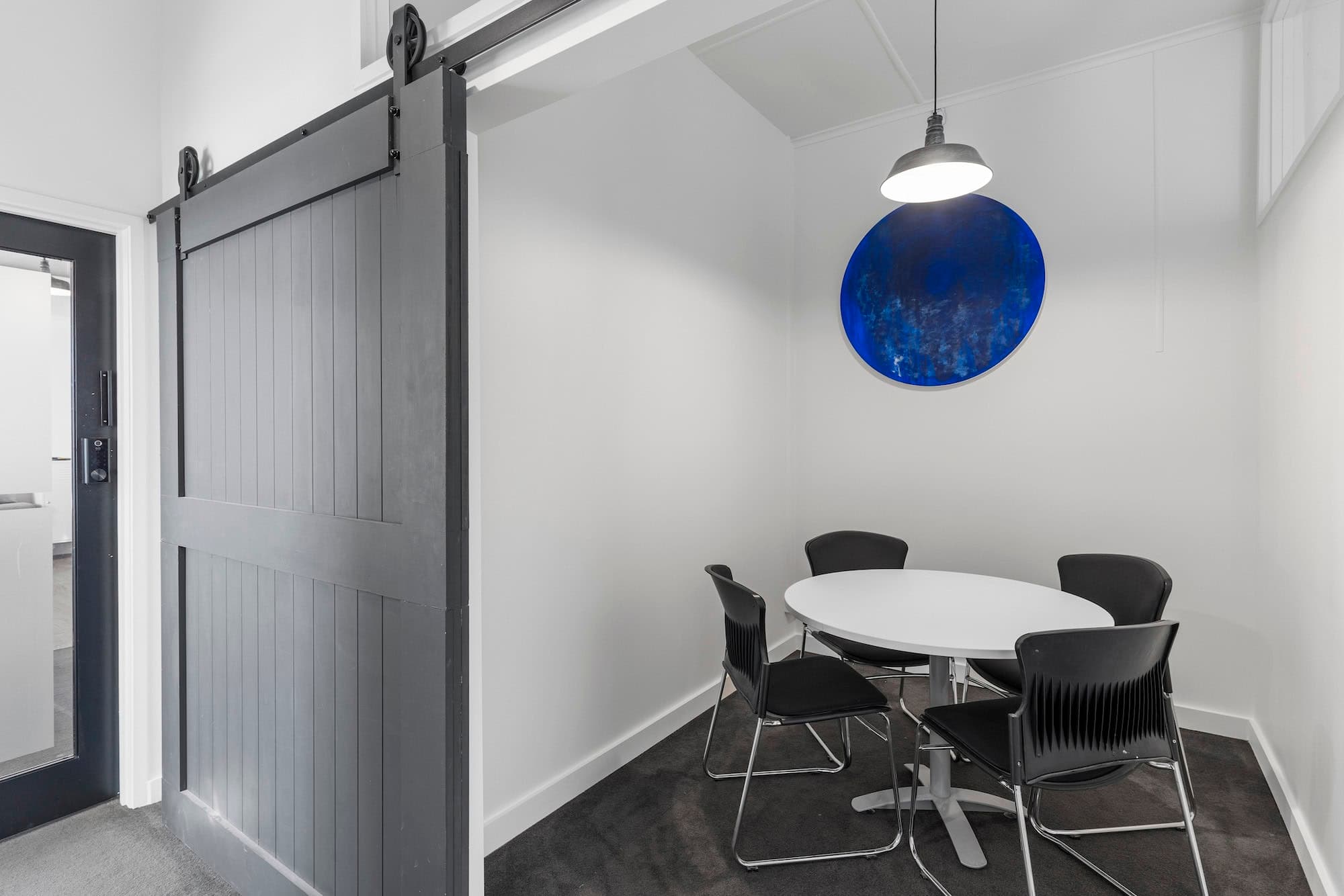 Stylish coworking space interior with plants and natural design elements